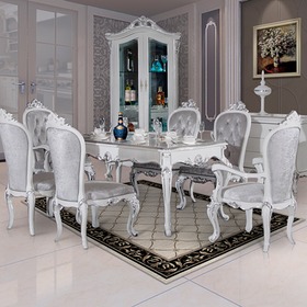 橙蒂雕花实木餐桌