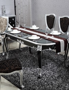 深邃黑雕银餐桌